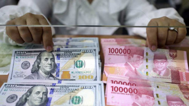 Pinjaman Melesat, Simpanan Masyarakat di Bank Tumbuh Melambat