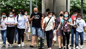 Aturan Dilonggarkan, Banyak Warga Singapura Tetap Pakai Masker di Dalam Ruangan