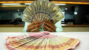 Khawatir Sentimen Global, Nilai Tukar Rupiah Ditutup Stagnan di Level Rp14.843