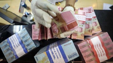 Rupiah Menutup Akhir Pekan Melemah ke Rp14.895 per Dolar AS