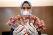 Rupiah dan Mayoritas Mata Uang Asia Loyo, Dolar AS Makin Ganas