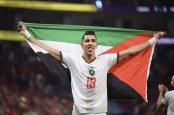 Lolos 16 Besar, Timnas Maroko Kibarkan Bendera Palestina di Lapangan
