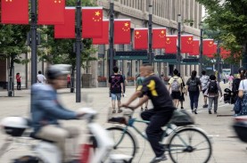 Lonjakan Covid-19 di China Jelang Imlek Bikin Pedagang…