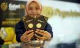 Harga Emas Pegadaian di Awal Ramadan Kompak Turun, Borong untuk THR Lebaran