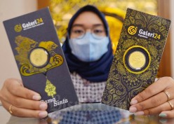 Panas Dingin Investor Emas Pasca Putusan The Fed