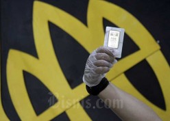 Harga Emas Antam Hari Ini Turun Rp10.000 per Gram, Cek Lengkapnya