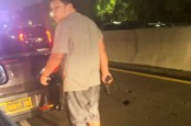 Kronologi Pengemudi Taksi Online Ditodong Pistol Koboi Jalanan di Exit Tol Tomang