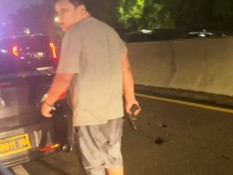 Kronologi Pengemudi Taksi Online Ditodong Pistol Koboi Jalanan di Exit Tol Tomang