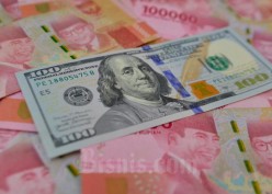 Rupiah Ditutup Melemah ke Rp14.985, Dolar AS Tersengat Plafon Utang