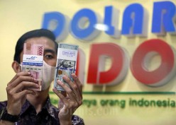 Rupiah Ditutup Menguat Rp14.890, Indonesia Turunkan Inflasi Lebih Cepat