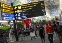 Penumpang pesawat berada di Terminal 3 Bandara Soekarno Hatta, Tangerang, Banten, Kamis (22/12/2022). Bisnis/Himawan L Nugraha