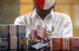 BI Tahan Suku Bunga Acuan, Rupiah Ditutup Menguat ke Level Rp14.940