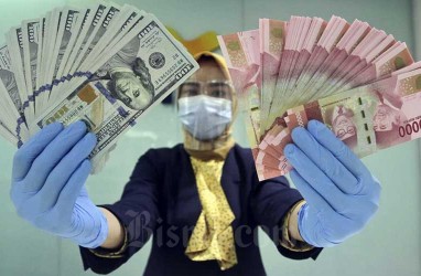 Rupiah Dibuka Tangguh Rp14.965 Berkat Inflasi AS Melambat