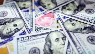 Rupiah Dibuka Melemah ke Level Rp15.033 Jelang FOMC The Fed