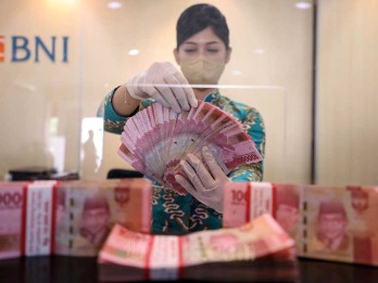 Proyeksi Rupiah dan Obligasi Imbas Fitch Pangkas Peringkat Utang AS