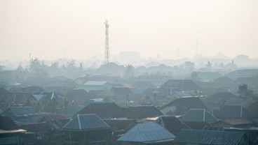 Kabut Asap Selimuti Kota Palembang