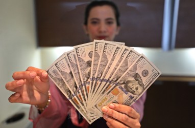Rupiah Akhir Pekan Ditutup Stagnan ke Rp15.327, Waswas Gejolak AS-China