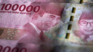 Rupiah Dibuka Lesu ke Rp15.384 Usai The Fed dan BI Tahan Suku Bunga