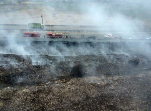 Tempat Pembuangan Sampah Ilegal di Samping Tol Cibitung-Cilincing Terbakar