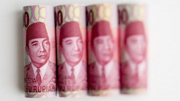 Rupiah Ditutup Perkasa, Isyarat The Fed Pangkas Suku Bunga Tahun Depan