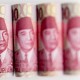 Rupiah Ditutup Perkasa, Isyarat The Fed Pangkas Suku Bunga Tahun Depan