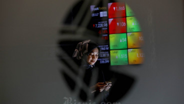 IHSG Sesi I Turun ke 7.300, Saham TPIA & ASII Justru Cuan