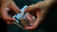 Pergerakan Rupiah Terhadap Dolar AS Berpotensi Balik ke Rp15.500