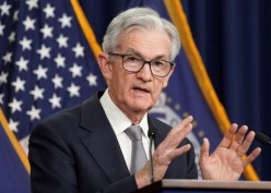 Wall Street Ditutup Bervariasi Usai FOMC The Fed Putuskan Tahan Suku Bunga Acuan