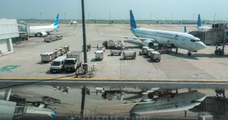 Pesawat milik maskapai penerbangan Garuda Indonesia terparkir di Bandara Internasional Soekarno-Hatta, Tangerang, Banten, Selasa (21/6/2022). Bisnis/Eusebio Chrysnamurti