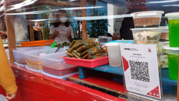 Membumikan Elektronifikasi Melalui QRIS di Bumi Mulawarman
