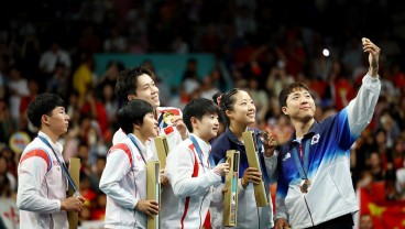 Foto Bersama Pemain Tenis Meja Korsel-Korut di Olimpiade Paris Jadi Viral