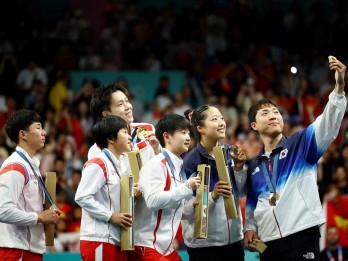 Foto Bersama Pemain Tenis Meja Korsel-Korut di Olimpiade Paris Jadi Viral