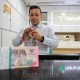 Rupiah Ditutup Menguat ke level Rp16.035 per Dolar AS