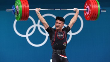Penuh Gaya, Ini Foto-foto Dramatis Rizki Juniansyah Sabet Emas di Olimpiade Paris