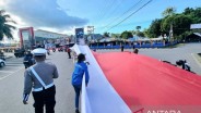 Pembentangan Bendera Merah Putih 12,77 Kilometer di Manokwari Raih Rekor Muri