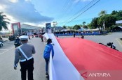 Pembentangan Bendera Merah Putih 12,77 Kilometer di Manokwari Raih Rekor Muri