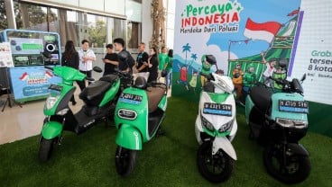 Syarat Daftar Mitra Grab Electric, Potensi 'Gaji' Rp12 Juta per Bulan