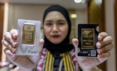 Harga Emas Antam di Pegadaian Akhir Pekan Melejit, Tembus Rp1.465.000 per Gram