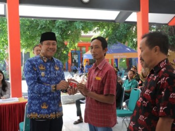 Penyaluran Insentif RT dan RW di Ngawi Gandeng Bank Jatim