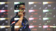 IHSG Ditutup Melemah saat BI Pangkas Suku Bunga, Saham GOTO hingga ADRO Loyo