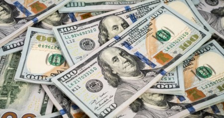 Ilustrasi modal asing dalam bentuk mata uang dolar AS. Dok Freepik