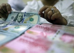 Rupiah Ditutup Perkasa Rp15.586 per Dolar AS Hari Ini