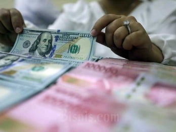 Rupiah Ditutup Perkasa Rp15.586 per Dolar AS Hari Ini