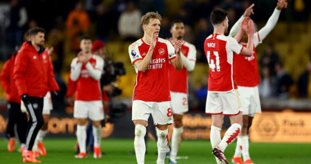 Tim Arsenal dan gelandang the Gunners, Martin Odegaard. Prediksi Skor Inter Milan vs Arsenal 7 November: Susunan Pemain, H2H/Reuters