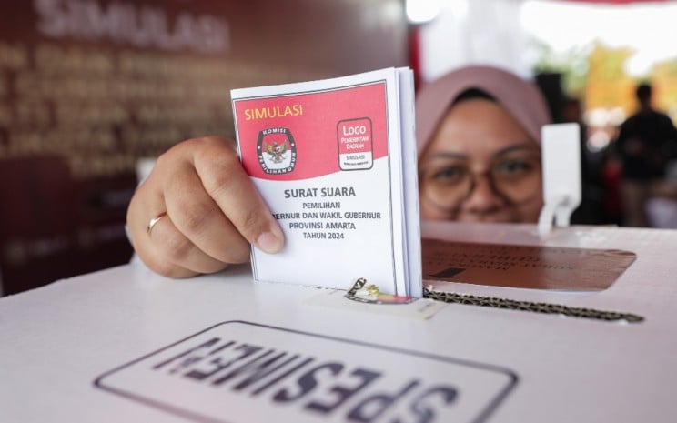 SIMULASI PEMUNGUTAN SUARA PILKADA Warga mengikuti simulasi pemungutan suara Pilkada 2024 di Depok, Jawa Barat, Sabtu (7/9/2024). IBI/Bisnis - Fanny Kusumawardhani