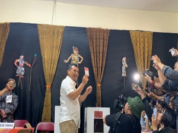 Potret Ahmad Luthfi Umbar Senyum Lebar saat Coblosan di TPS Solo