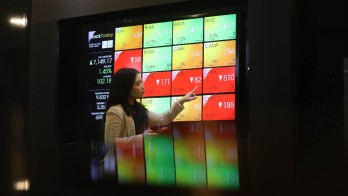 IHSG Rawan ke 6.950 Jelang RDG BI, Cek Saham EMTK, ADRO & MIDI