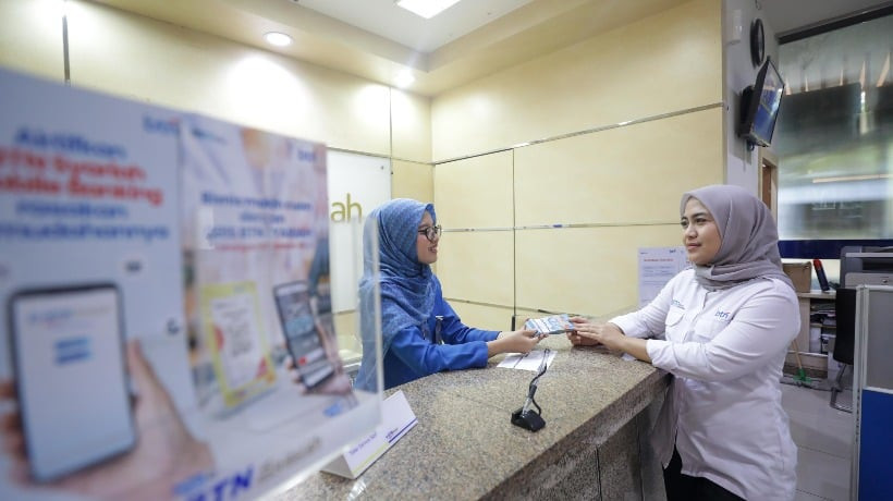 Setelah mengumumkan rencana mengakuisisi Bank Victoria Syariah BTN Syariah membuka peluang akuisisi bank syariah lainnya. (Bisnis/Himawan L. Nugraha)