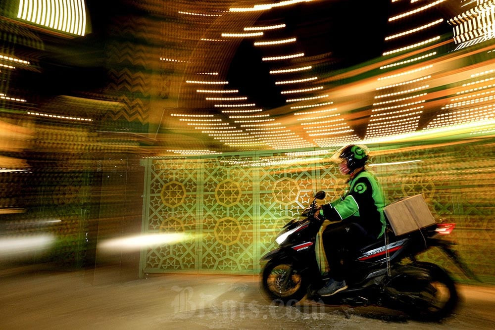 Driver ojek online Gojek melintas di Jakarta. Bisnis/Nurul Hidayat