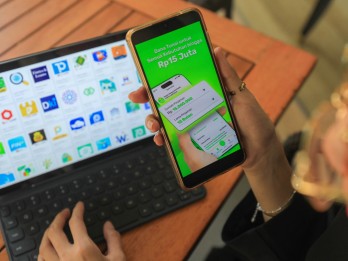 'Senyum Simpul' Industri Fintech Lepas Beban Rugi, Tren Positif Berlanjut pada 2025?